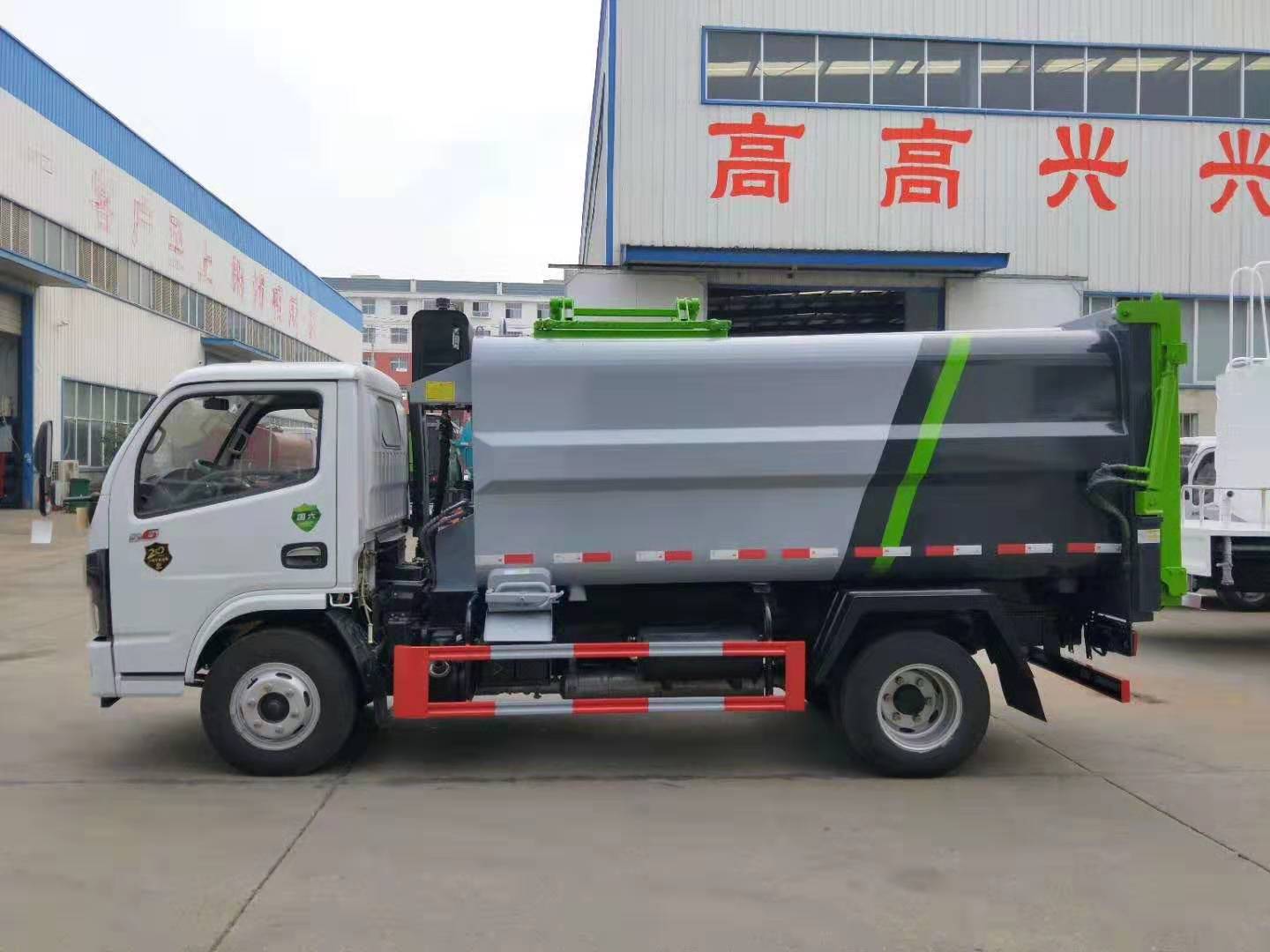 國六側(cè)裝掛桶壓縮垃圾車藍牌廠家定制
