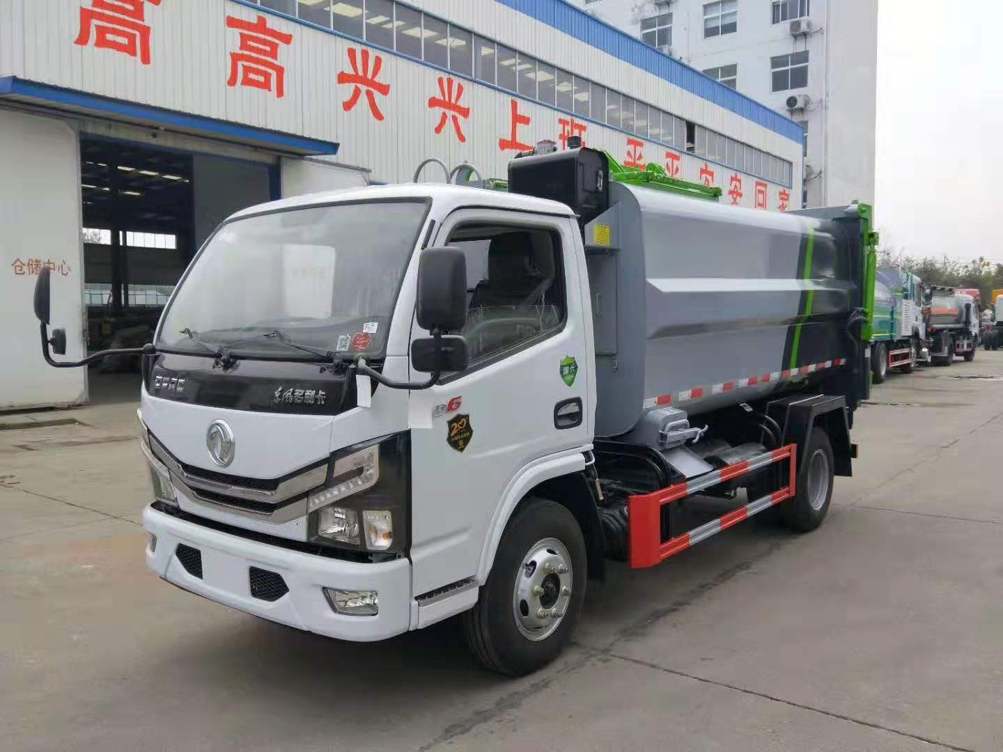 國六側(cè)裝掛桶壓縮垃圾車藍牌廠家定制